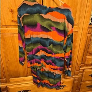 Beautifully colored matching skirt and top set , you are sure to get noticed!